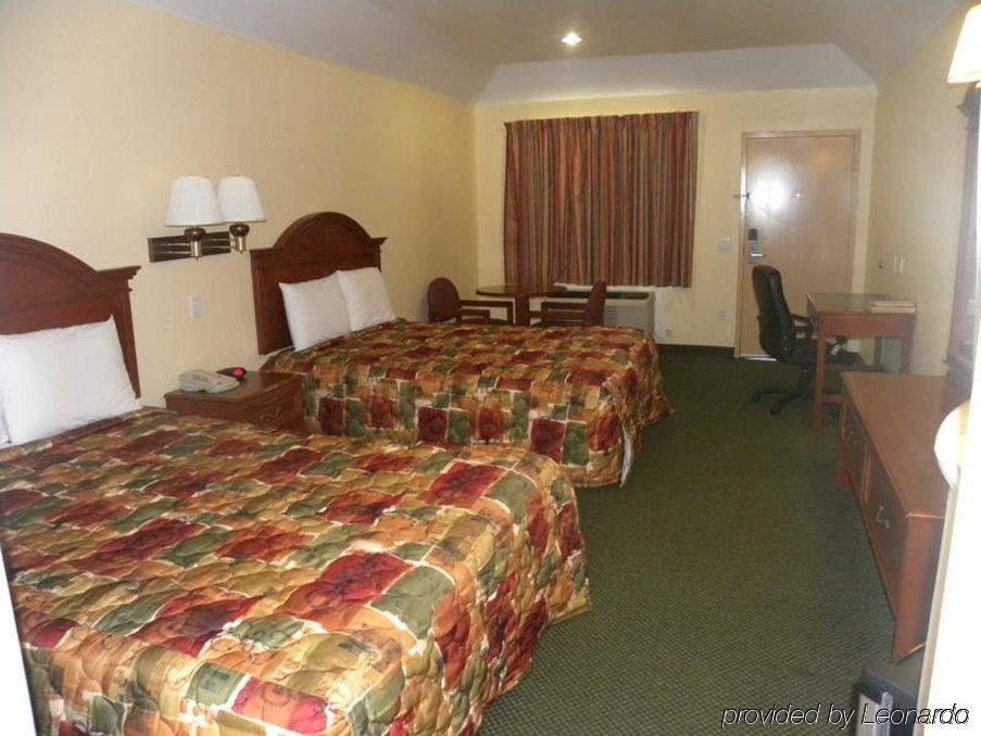 Porter Executive Inn & Suites Ruang foto